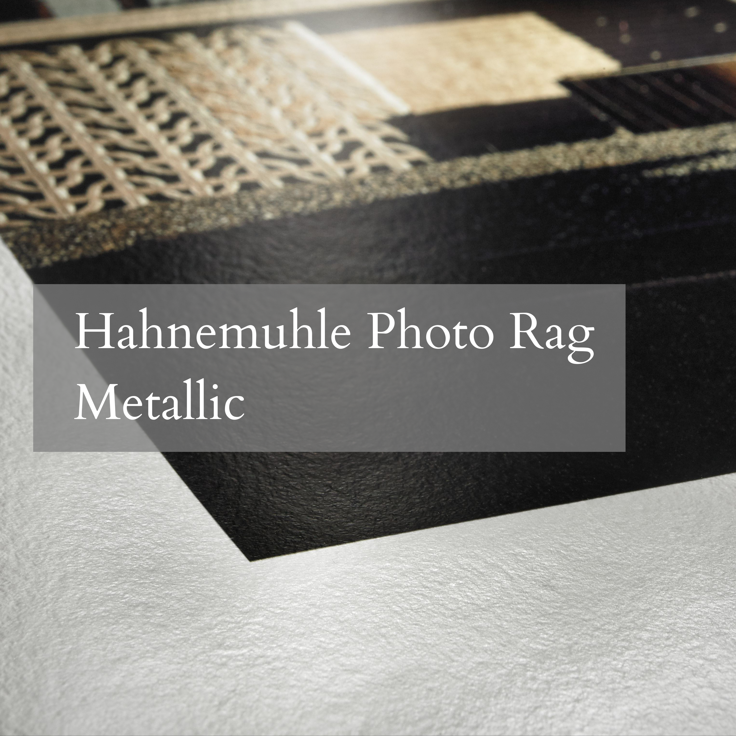 Hahnemuhle Photo Rag Metallic paper with textured surface and white border.